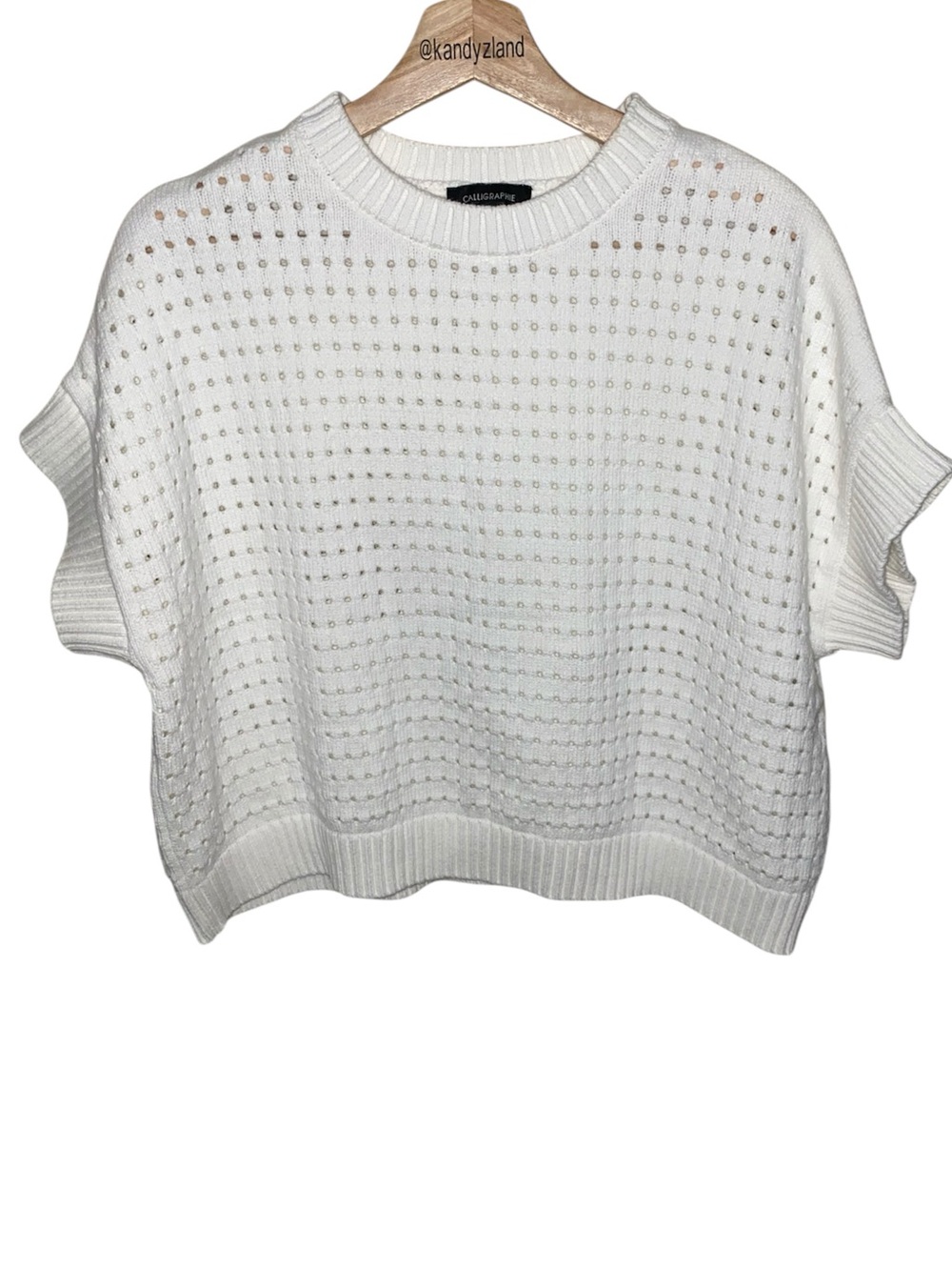 CALLIGRAPHIE  pointelle knit top features a ribbed crewneck